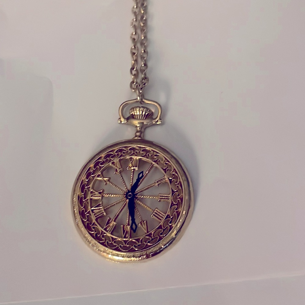 Goldtone vintage faux compass necklace